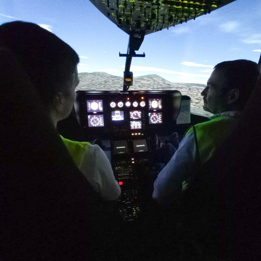 helicopter pilot at flight simulator