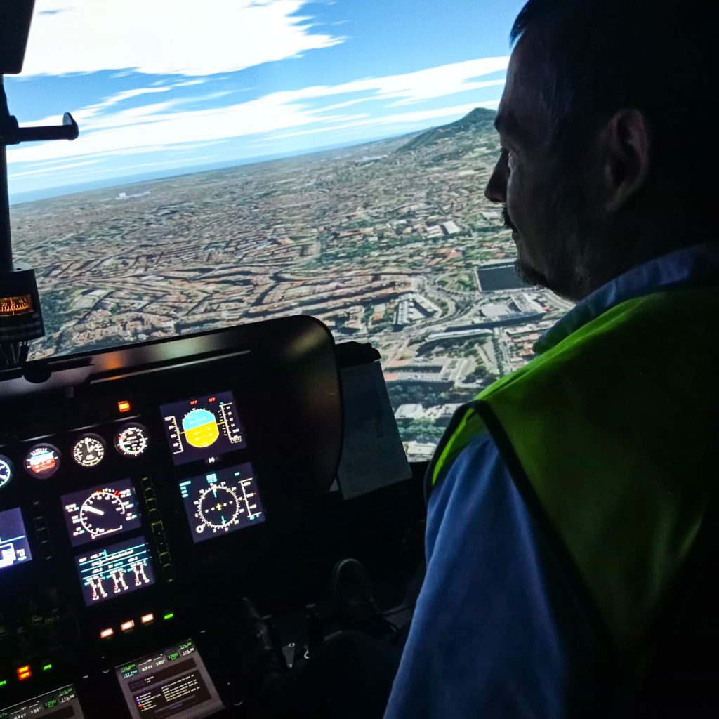 helicopter pilot at flight simulator