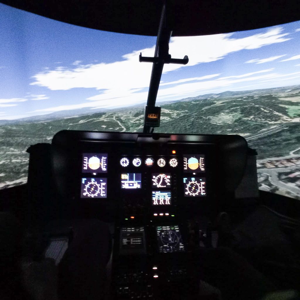 helicopter pilot at flight simulator