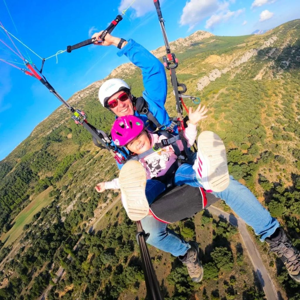 From what age can a child fly tandem paragliding 1